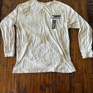 Small Graphic t-shirt from Garage small hole on side of shirt